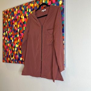 Dark pink peachy blouse with a zipper on the front